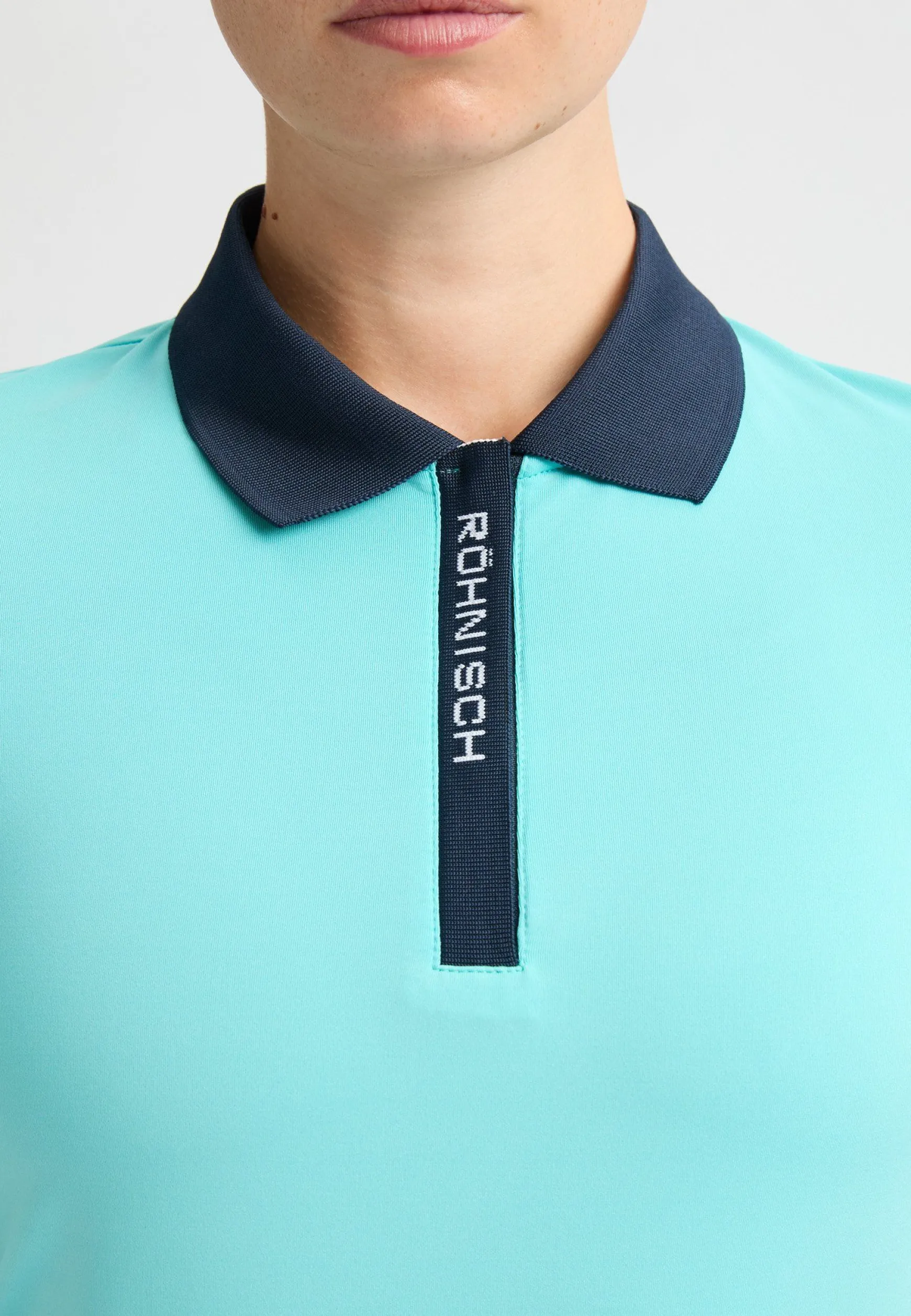abby_poloshirt_capri_bree_1.webp Abby Poloshirt, -Röhnisch New