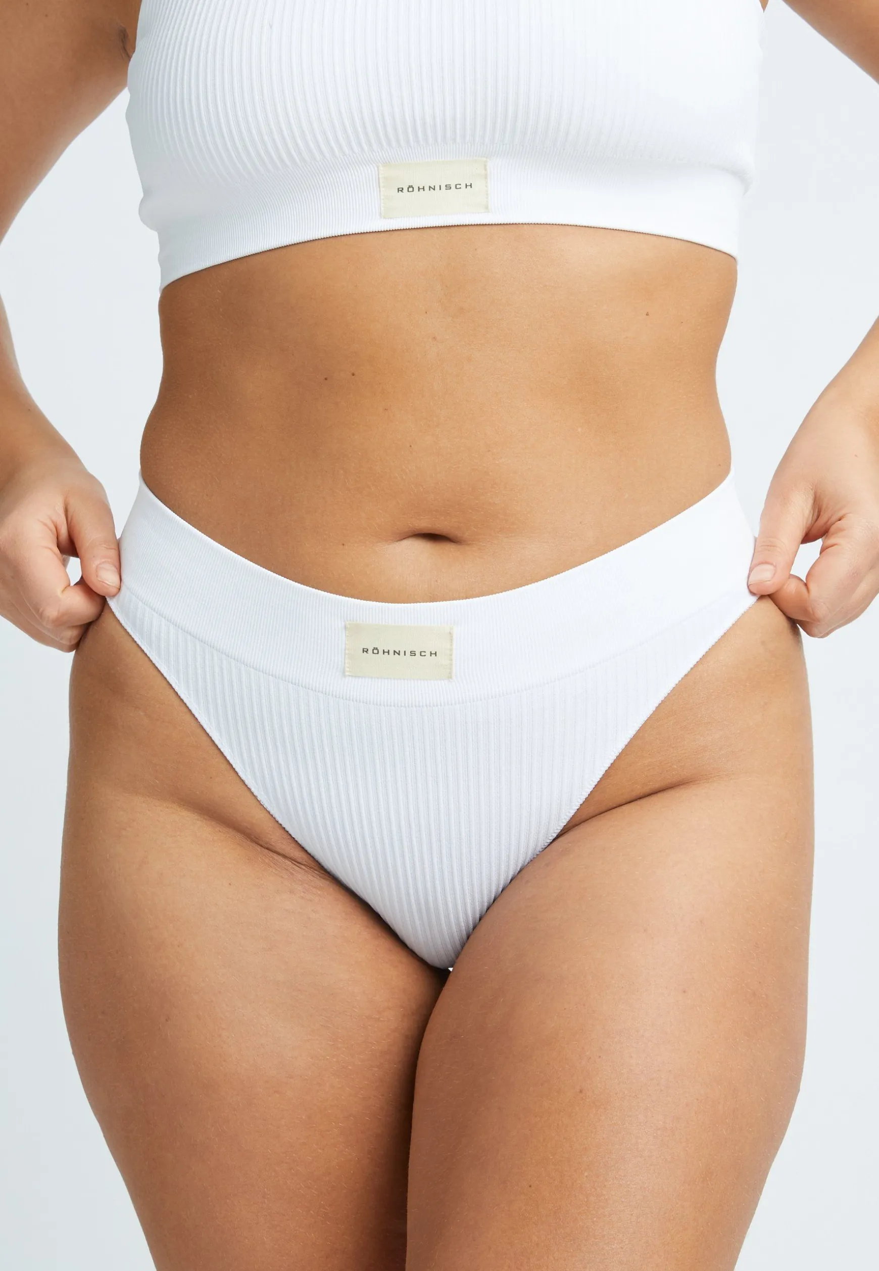 micro_rib_string_white_2.webp Micro Rib String, -Röhnisch Store