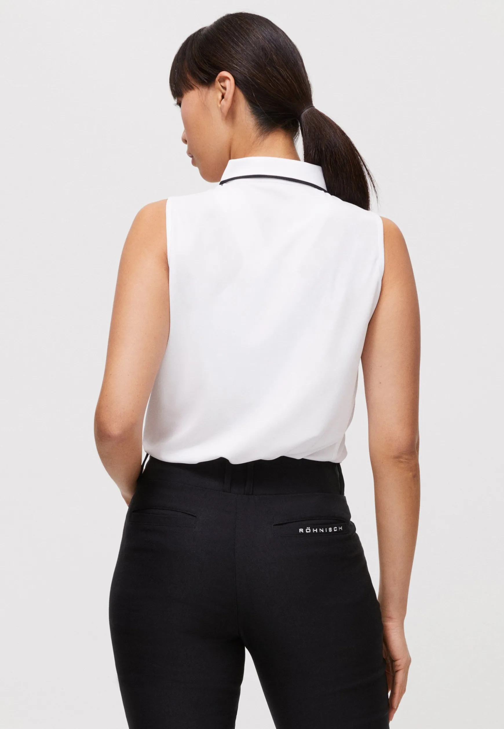 miriam_sleeveless_poloshi_0-3.webp Miriam Sleeveless Poloshirt, -Röhnisch Shop